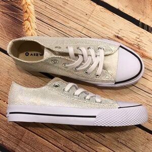 Reptile metallic rainbow fleck Airwalk kicks.